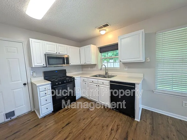 7603 Lullwater Cv — Photo 4