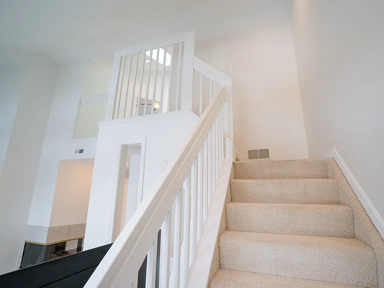 Stairs to upper level from main level