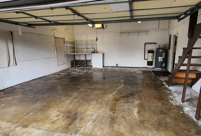 2 car garage off of the den