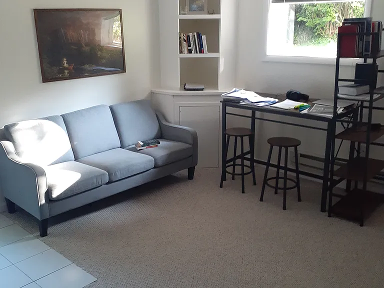 Living room is NOT furnished (but shown with previous tenant's furniture).