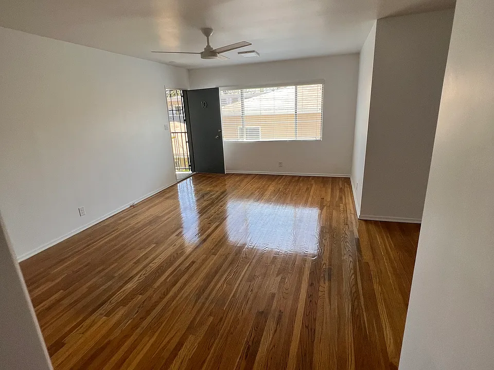 Living room- Open front door, with security screen.