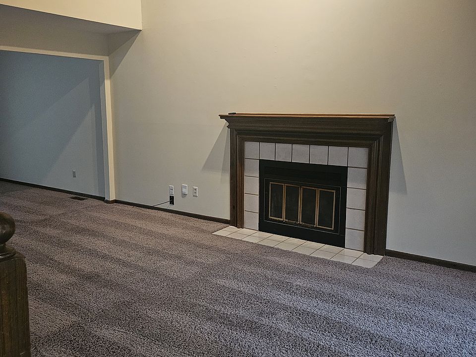 Living room with real wood burning fireplace
