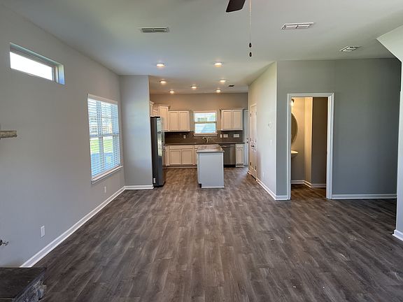 dining room is located in between the great room kitchen. dining room is located at the double wi