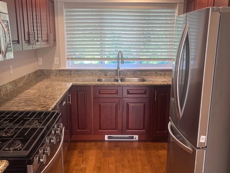 Large kitchen with gas range.