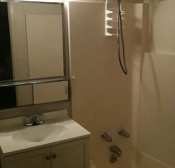 Clean bathroom with full tub