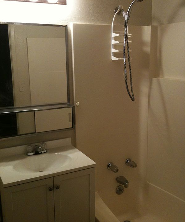 Clean bathroom with full tub