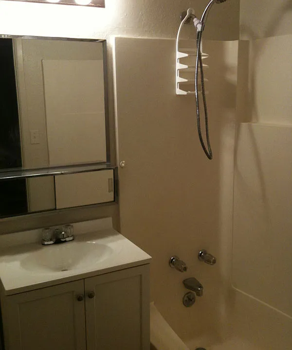 Clean bathroom with full tub