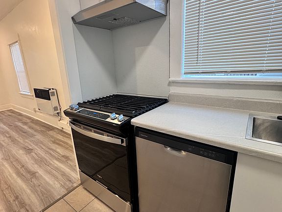 Updated kitchen with gas stove and dishwasher