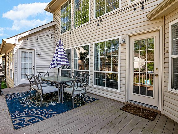 Back deck with a fenced in yard!