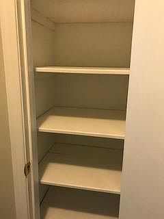 Linen storage in bathroom.