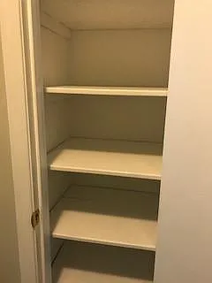 Linen storage in bathroom.