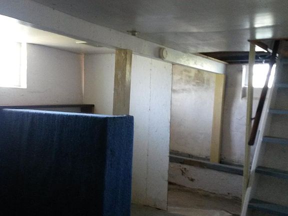 Basement. Unfinished. Washer and dryer hookup.