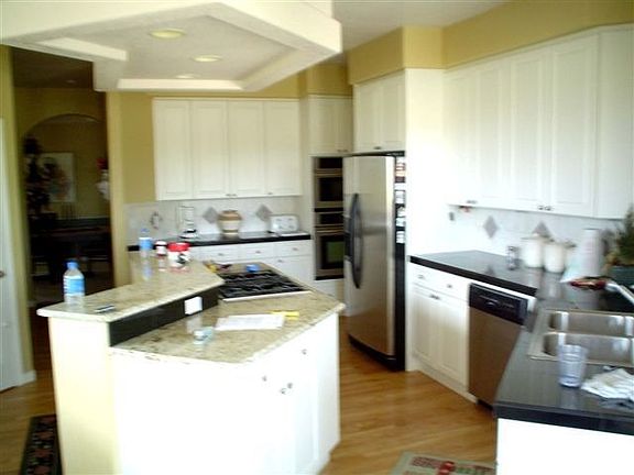 Kitchen with island and granite