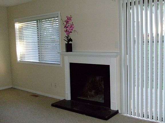Living rm w/fp, rom is much bigr than pictur would allow.
