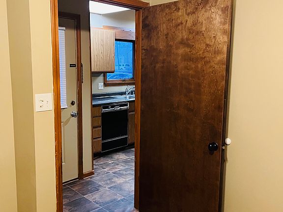 Looking out from downstairs bedroom towards kitchen area.