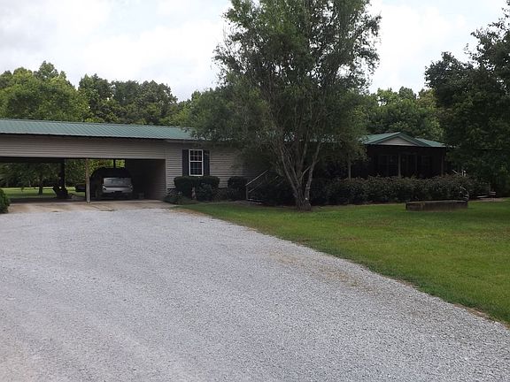 Double carport & front of house