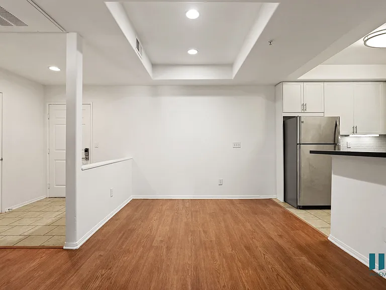 Front Entrance, Kitchen, and Dining Room Area