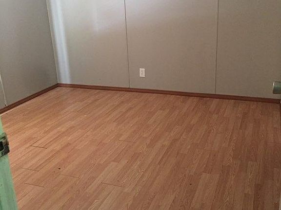 This bedroom is behind kitchen area .Master.