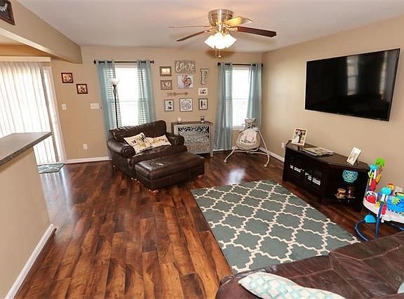 Pergo laminate flooring graces the main level.