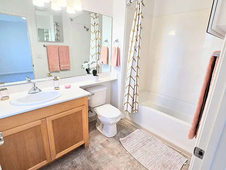 En Suite full bathroom attached to main bedroom. Fan or window available!