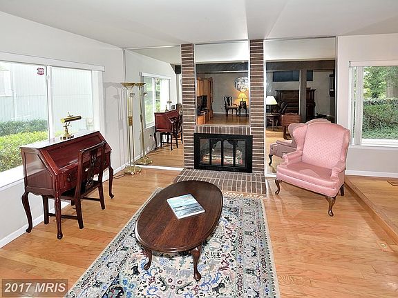 Living Room with fireplace and hardwood floors