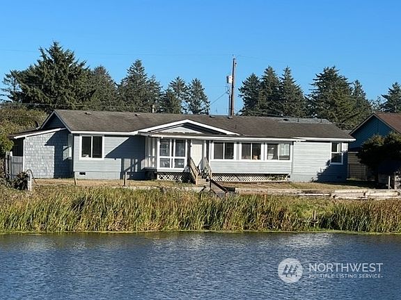 Large yard & a dock.>
