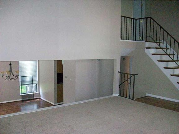 There is new half- wall here. Seen in previous photo behind couch.