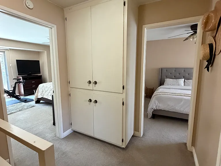 Hallway upstairs with storage