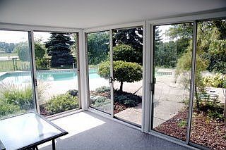 View from three-season patio to pool