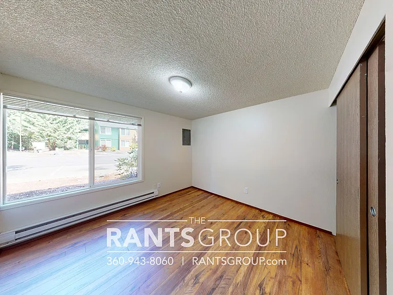 Lovely, wooded 2-bedroom apartment with a large private deck and in-unit washer & dryer! — Photo 45