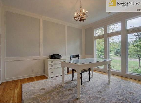 Main level study complete with "secret" storage behind built-ins