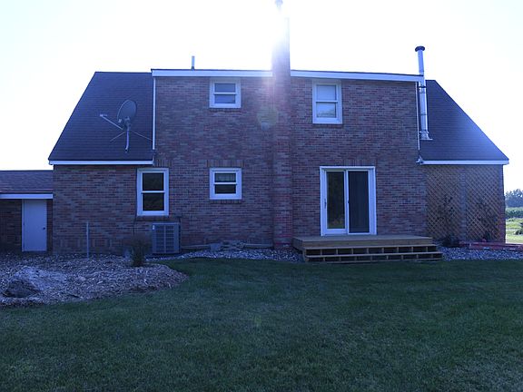 Back of house with newly built porch.