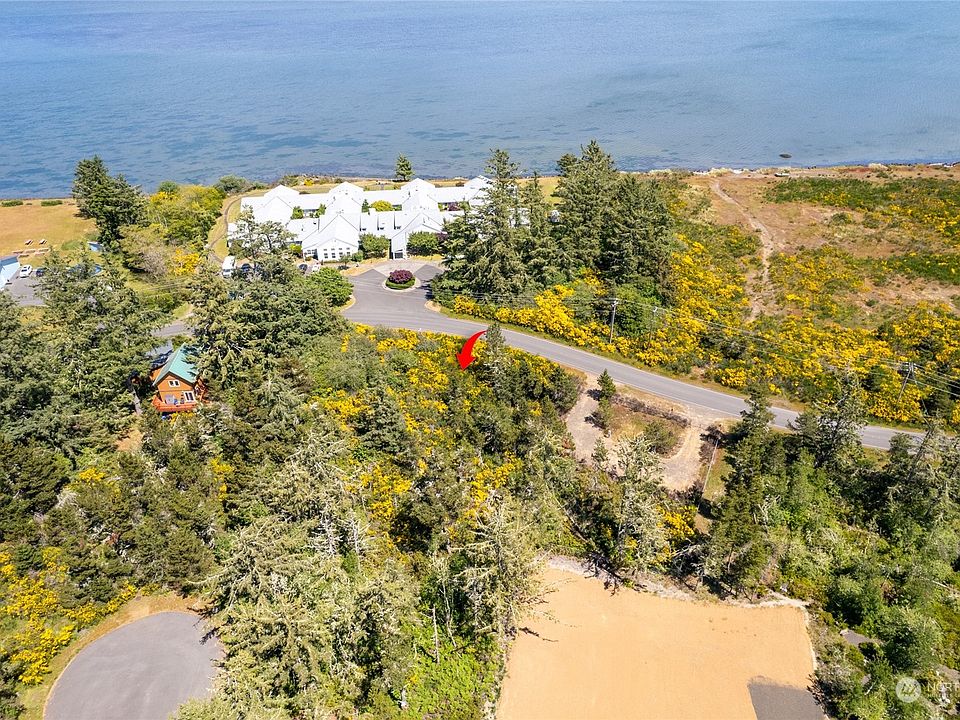Orange two story two lots down has ocean views from second story. Seller was willing to let us look from his second floor.>