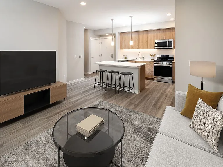 Living room and kitchen with hard surface flooring