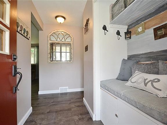 Nothing says welcome like not having to hop around to take off your shoes! The entry & bench seat provide storage!