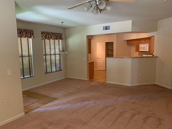 Living room, dining area and kitchen.
