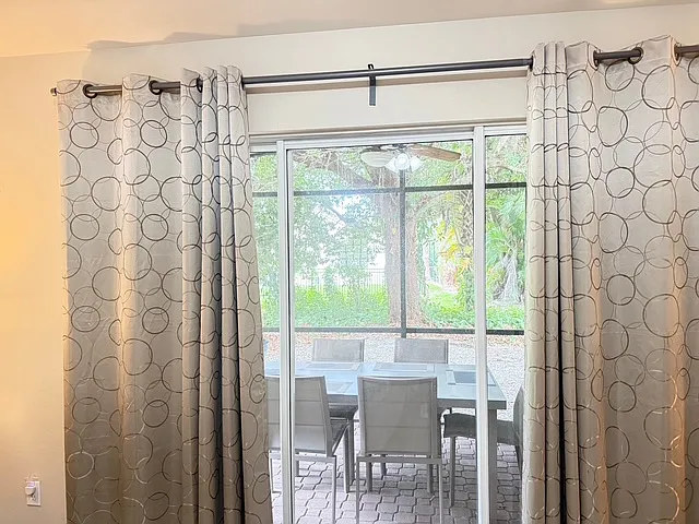 Main bedroom sliders to screened lanai
