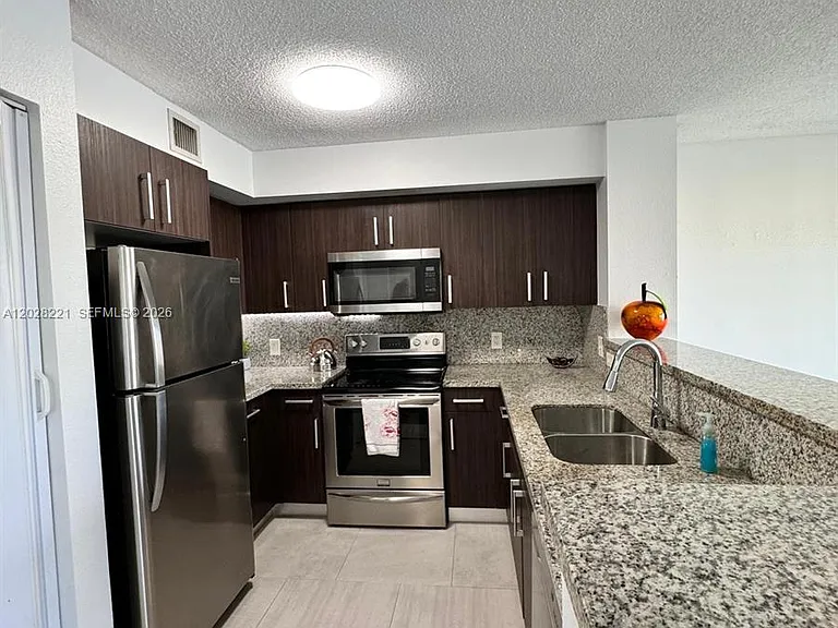 4420 NW 107th Ave #206 — Photo 1