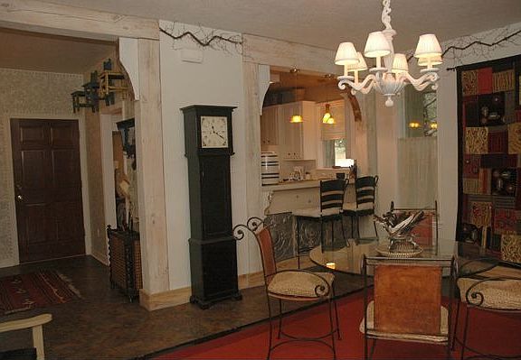 Kitchen has breakfast that opens to dining for easy serving.