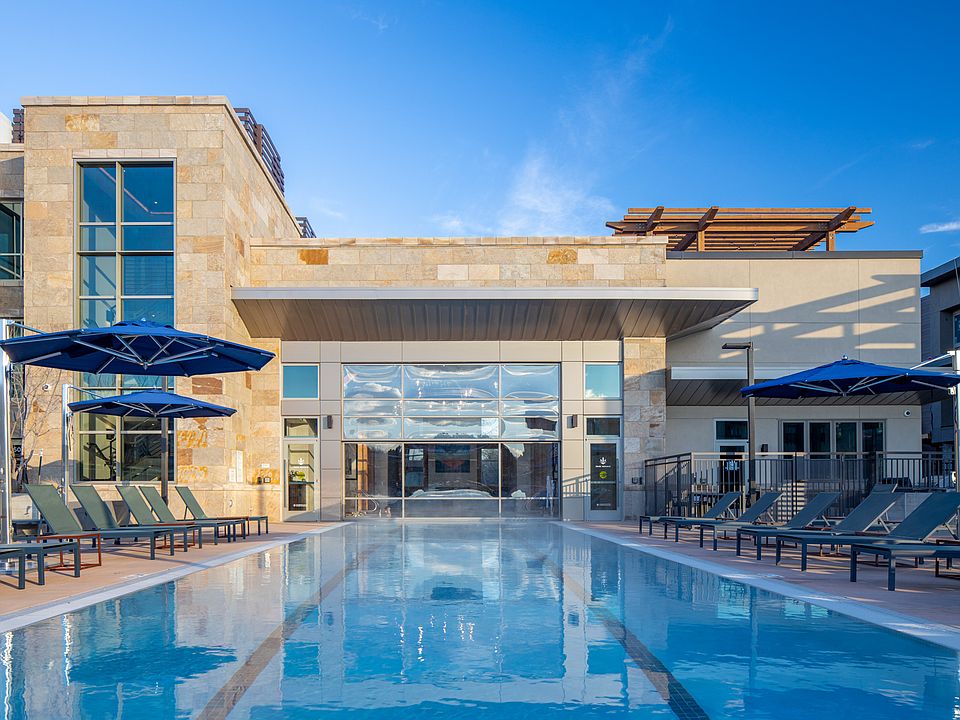 25-meter heated indoor / outdoor saltwater swimming pool with retractable glass wall
