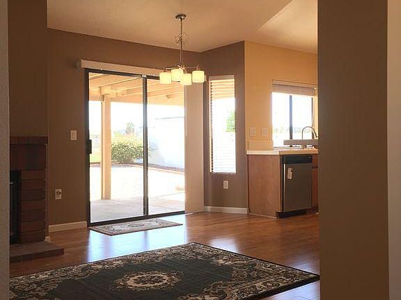 Family room, eating nook and kitchen (taken from entry)