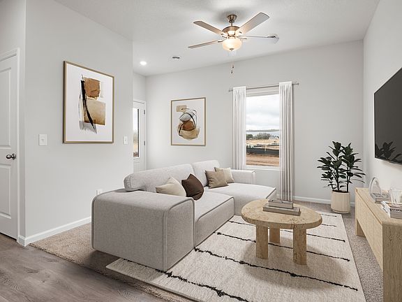 The open layout has the family room open to the kitchen and dining area.