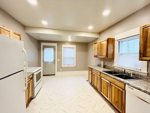 Eat-In Kitchen has stove, fridge, and dishwasher.