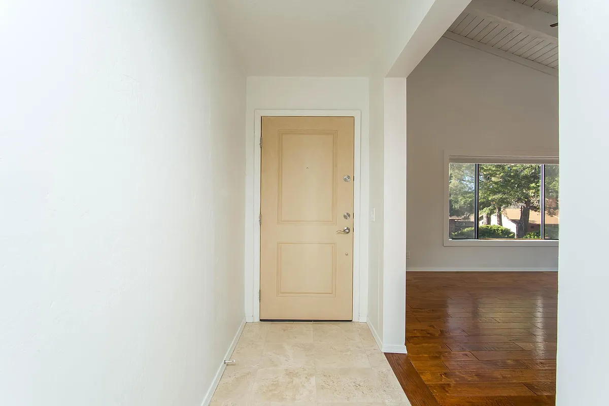 Front door from within the home. Living room on the right. - 180 Sierra Rd
