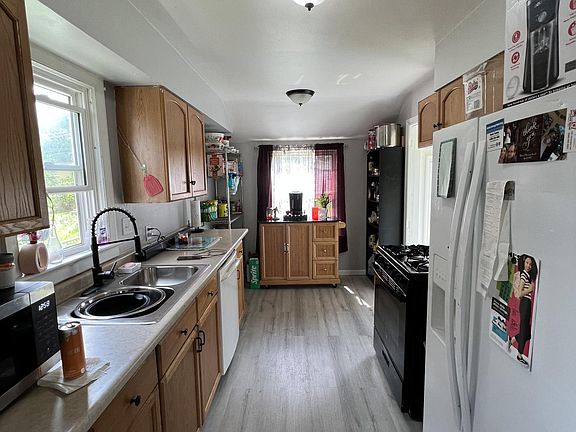 Updated kitchen with waterproof vinyl plank floors