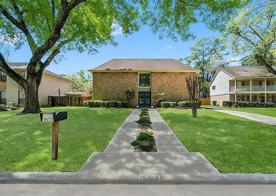 Long walkway provides a dramatic entry to this lovely home.
