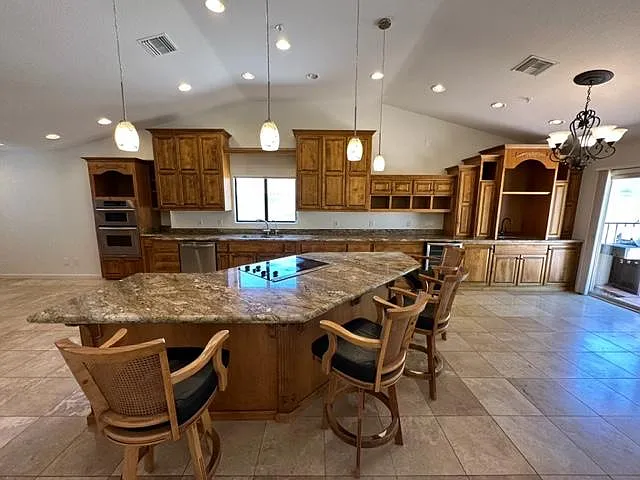 Open floor plan, single level. Bar stools included in rental. - 10166 N 105th Way
