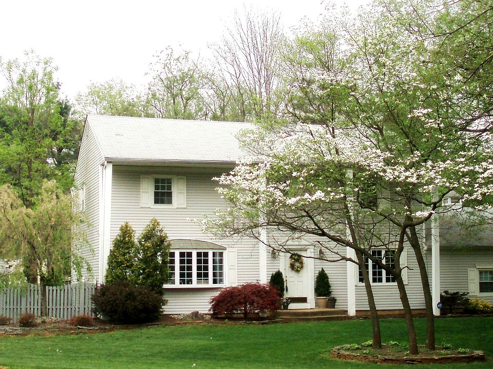 Gorgeous Front Setting With Beautiful Dogwood Trees!