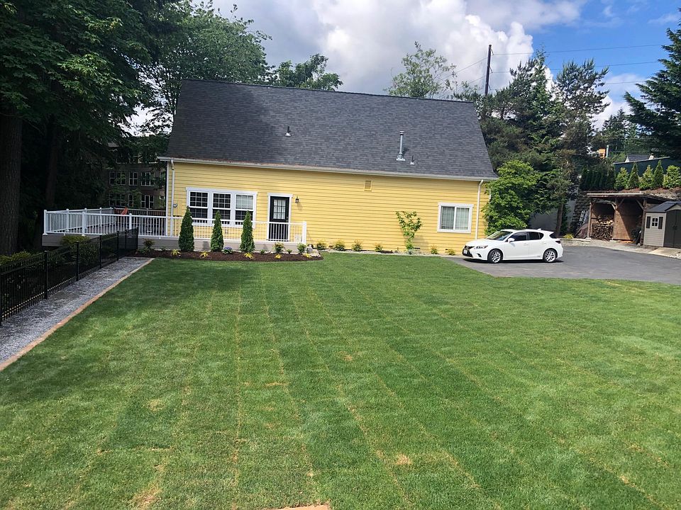 Large lawn welcomes you to the vintage farm house.