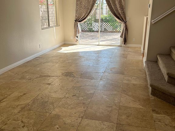 Formal Living room and Formal dining room open to the backyard